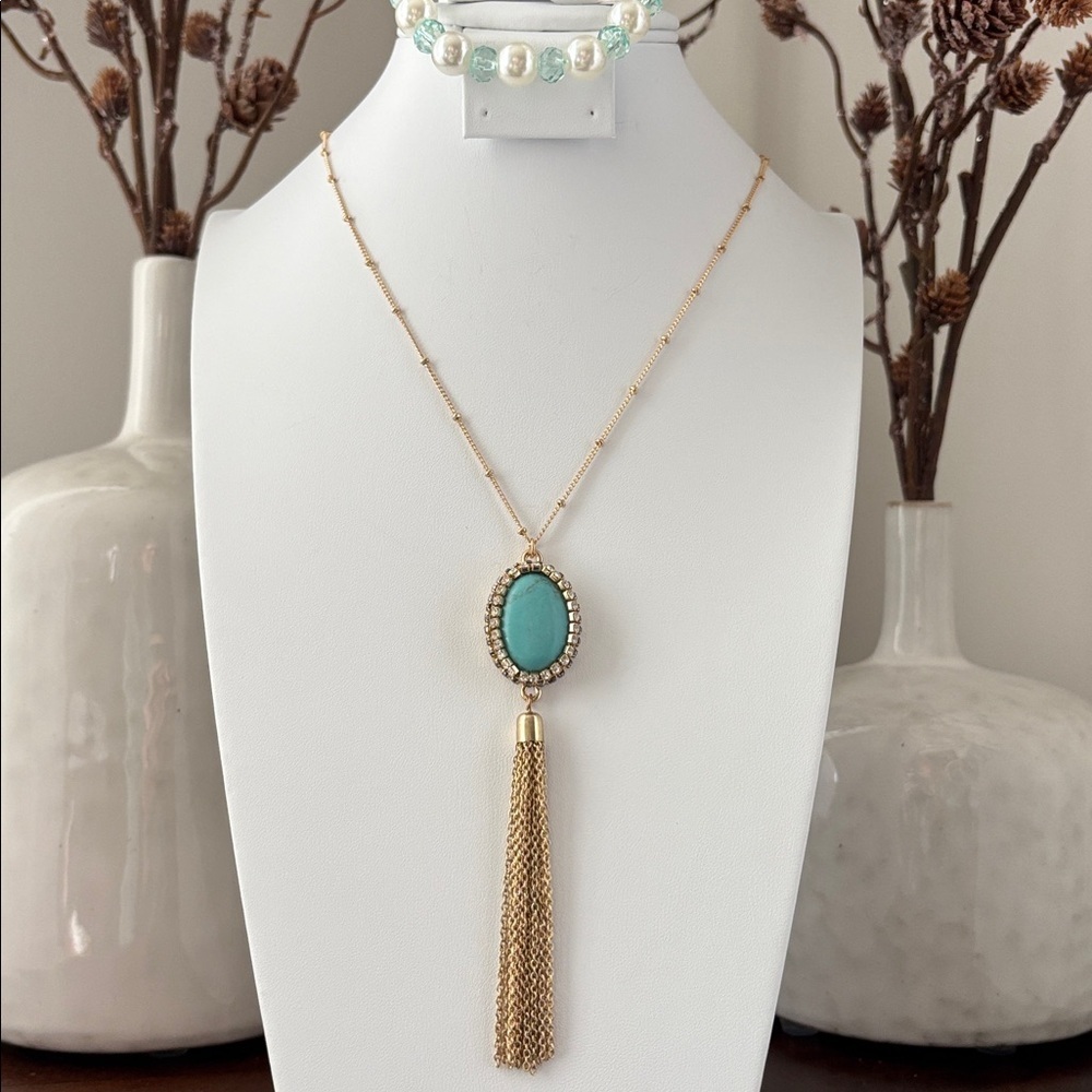 Laura Ford Goldtone tassel,turquoise charm,stretch pearl like bracelet & earring